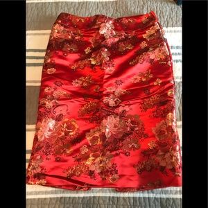 Red with gold flower detail pencil skirt.